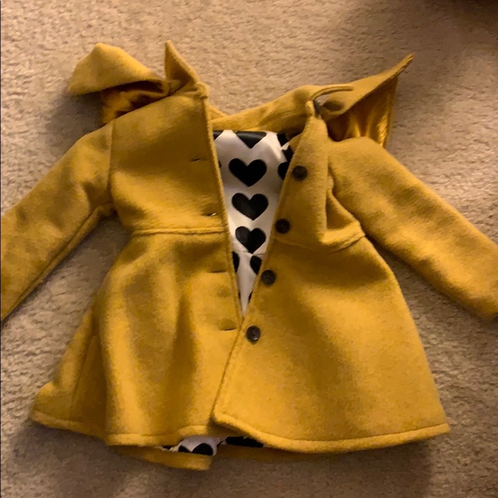 Coat with cape
